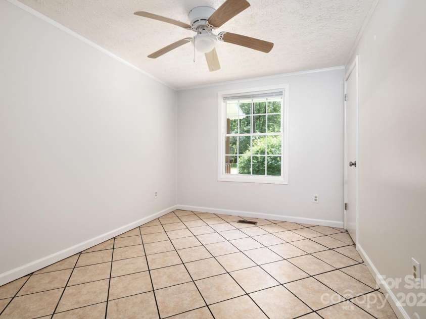 35 Pope Road, Brevard, NC 28712.  MLS# CAR4261354, YatesRealty ID 26591. Guest Bedroom