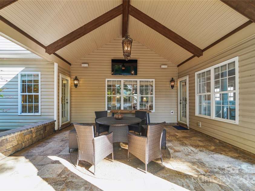 1237 Saint Johns Avenue, Matthews, NC 28104.  MLS# CAR4273618, YatesRealty ID 26593. Covered Back Porch