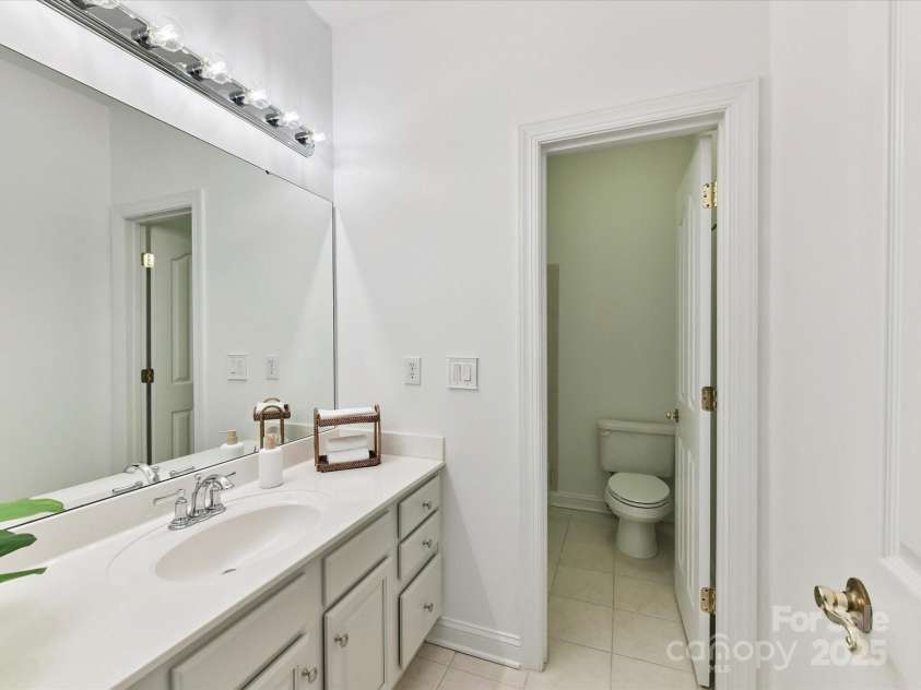 5434 Shoal Brook Court, Charlotte, NC 28277.  MLS# CAR4280902, YatesRealty ID 26602. Hall Bathroom