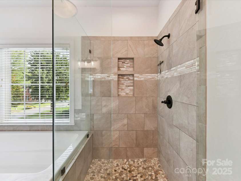 5434 Shoal Brook Court, Charlotte, NC 28277.  MLS# CAR4280902, YatesRealty ID 26602. Primary Bathroom Shower