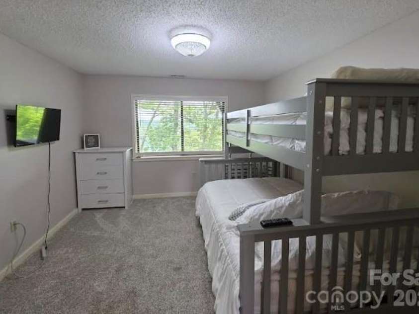 283 Tinequa Drive, Brevard, NC 28712.  MLS# CAR4369072, YatesRealty ID 26605. Guest Bedroom 