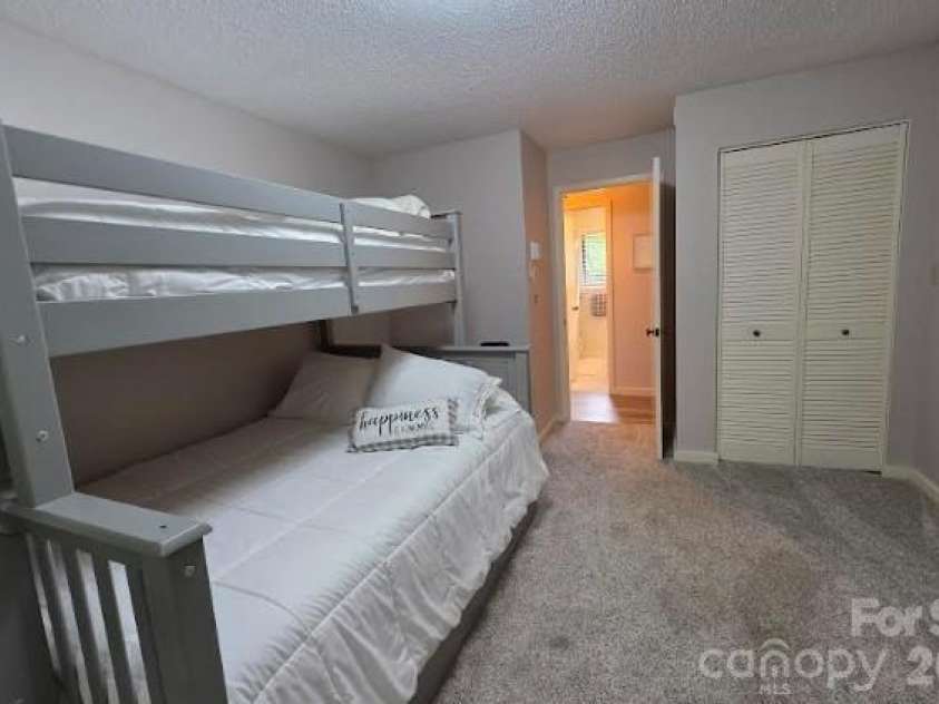 283 Tinequa Drive, Brevard, NC 28712.  MLS# CAR4369072, YatesRealty ID 26605. Guest Bedroom 