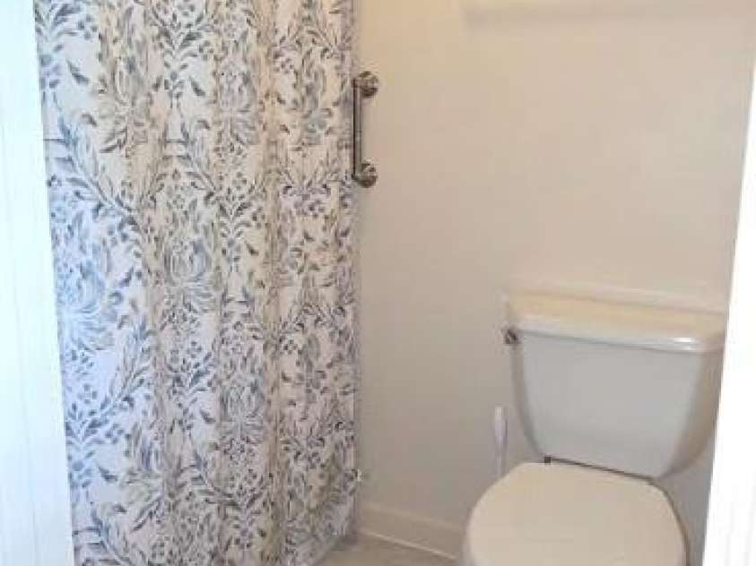283 Tinequa Drive, Brevard, NC 28712.  MLS# CAR4369072, YatesRealty ID 26605. Primary bathroom with stand up shower