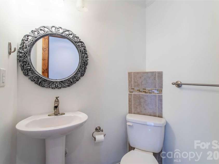 15 Bowman Ridge Road, Hendersonville, NC 28739.  MLS# CAR4369770, YatesRealty ID 26608. Half Bath