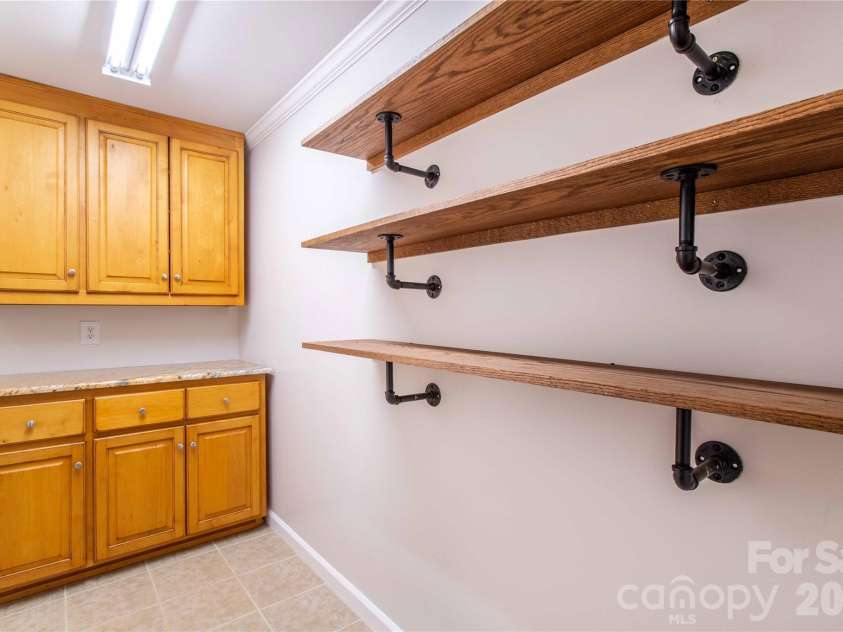15 Bowman Ridge Road, Hendersonville, NC 28739.  MLS# CAR4369770, YatesRealty ID 26608. Kitchen Pantry