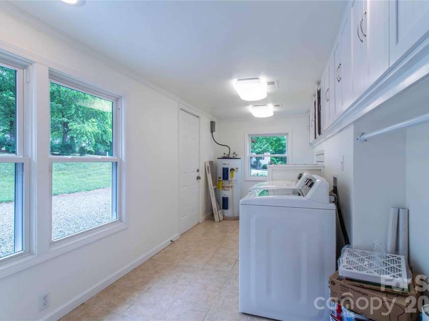 15 Bowman Ridge Road, Hendersonville, NC 28739.  MLS# CAR4369770, YatesRealty ID 26608. Laundry