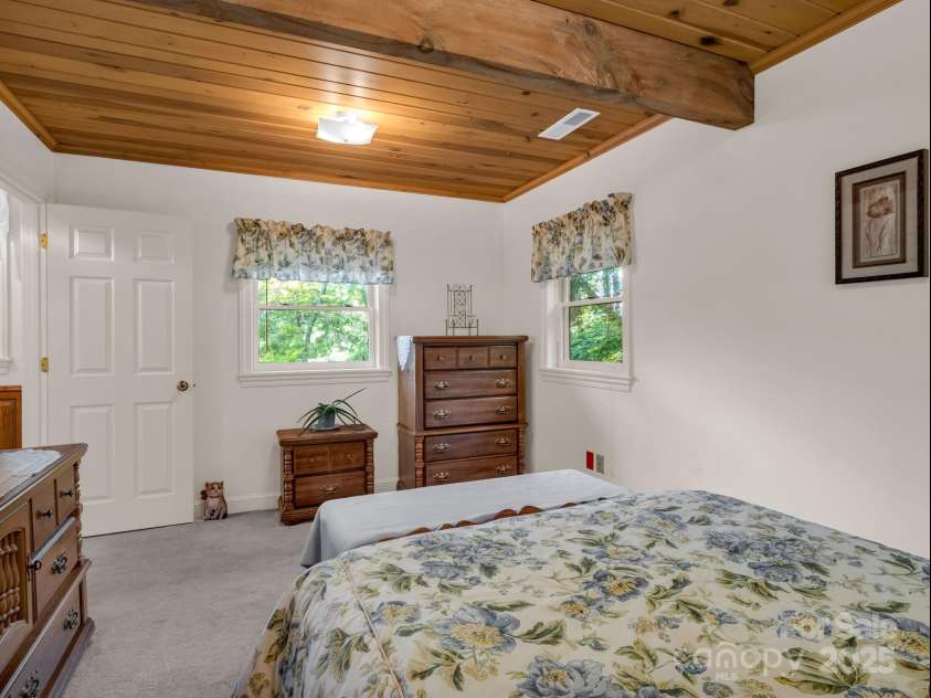 150 Marcellina Drive, Fairview, NC 28730.  MLS# CAR4279667, YatesRealty ID 26611. Bedroom (upstairs)