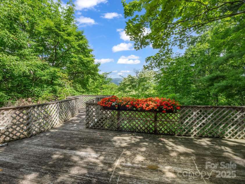 150 Marcellina Drive, Fairview, NC 28730.  MLS# CAR4279667, YatesRealty ID 26611. Large deck to enjoy the mtn views.