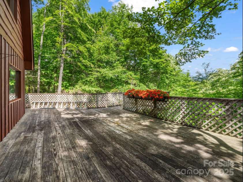 150 Marcellina Drive, Fairview, NC 28730.  MLS# CAR4279667, YatesRealty ID 26611. Large deck to enjoy the mtn views.