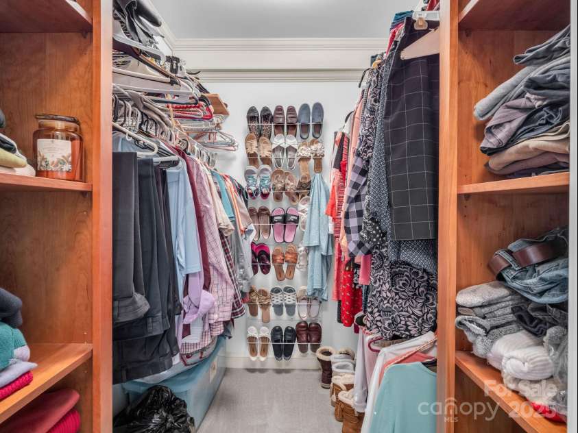 150 Marcellina Drive, Fairview, NC 28730.  MLS# CAR4279667, YatesRealty ID 26611. Primary bedroom walk-in closet