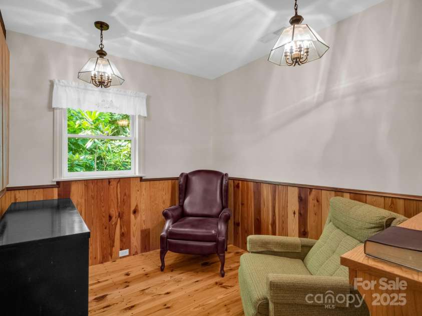 150 Marcellina Drive, Fairview, NC 28730.  MLS# CAR4279667, YatesRealty ID 26611. Sitting room (upstairs)