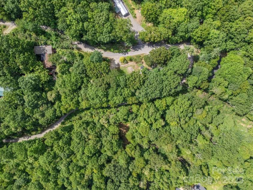 150 Marcellina Drive, Fairview, NC 28730.  MLS# CAR4279667, YatesRealty ID 26611. Situated on over 1.6 acres