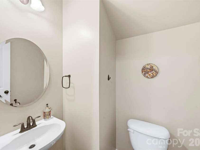 9564 Heritage Farm Avenue, Concord, NC 28027.  MLS# CAR4381734, YatesRealty ID 26612. Half bathroom on main level