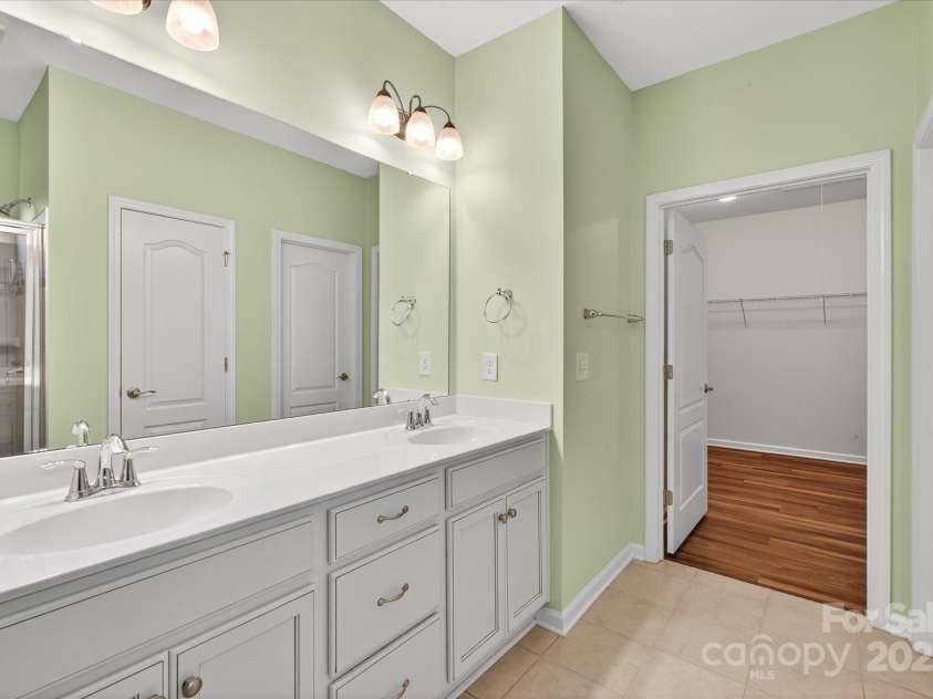 4057 Channel Islands Way, Lancaster, SC 29720.  MLS# CAR4292453, YatesRealty ID 2662. Owner's bathroom with dual sinks