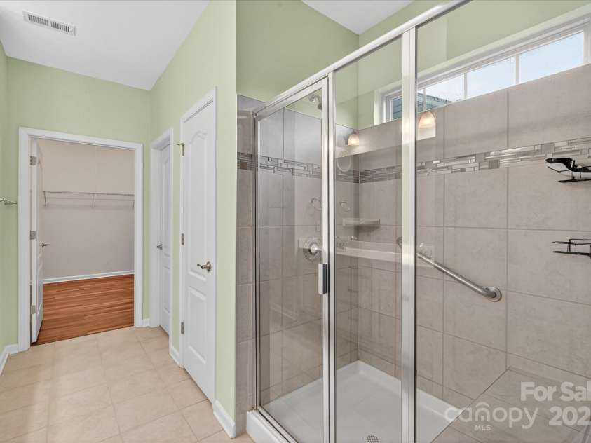 4057 Channel Islands Way, Lancaster, SC 29720.  MLS# CAR4292453, YatesRealty ID 2662. Owner's shower and large walk-in closet