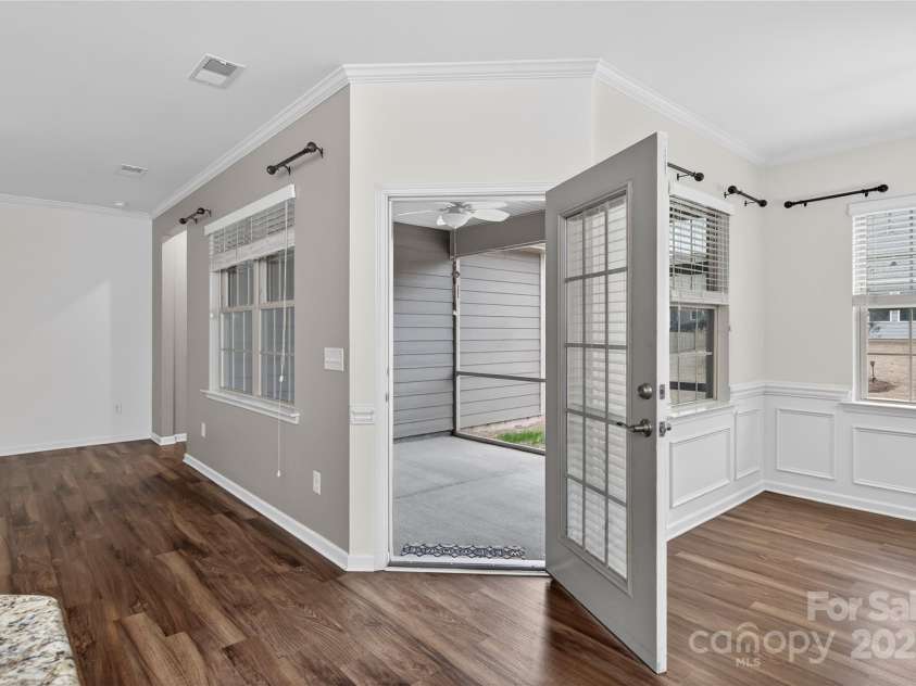 4057 Channel Islands Way, Lancaster, SC 29720.  MLS# CAR4292453, YatesRealty ID 2662. Step out for morning coffee on the screened in porch