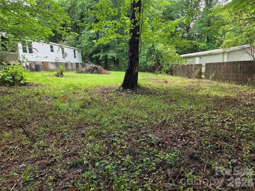 4 Boyer Drive, Black Mountain, NC 28711.  MLS# CAR4385462, YatesRealty ID 26625. Look how nicely the backyard lays!