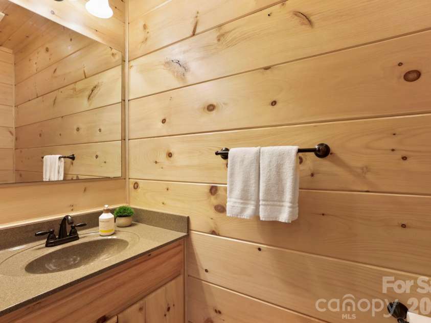 213 Big Valley Road, Pisgah Forest, NC 28768.  MLS# CAR4353319, YatesRealty ID 26629. 1/2 Bath on Main level 