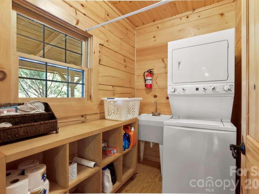 213 Big Valley Road, Pisgah Forest, NC 28768.  MLS# CAR4353319, YatesRealty ID 26629. Laundry 