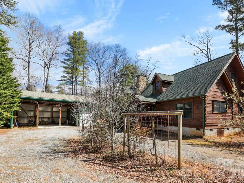213 Big Valley Road, Pisgah Forest, NC 28768.  MLS# CAR4353319, YatesRealty ID 26629. Log home and shop 