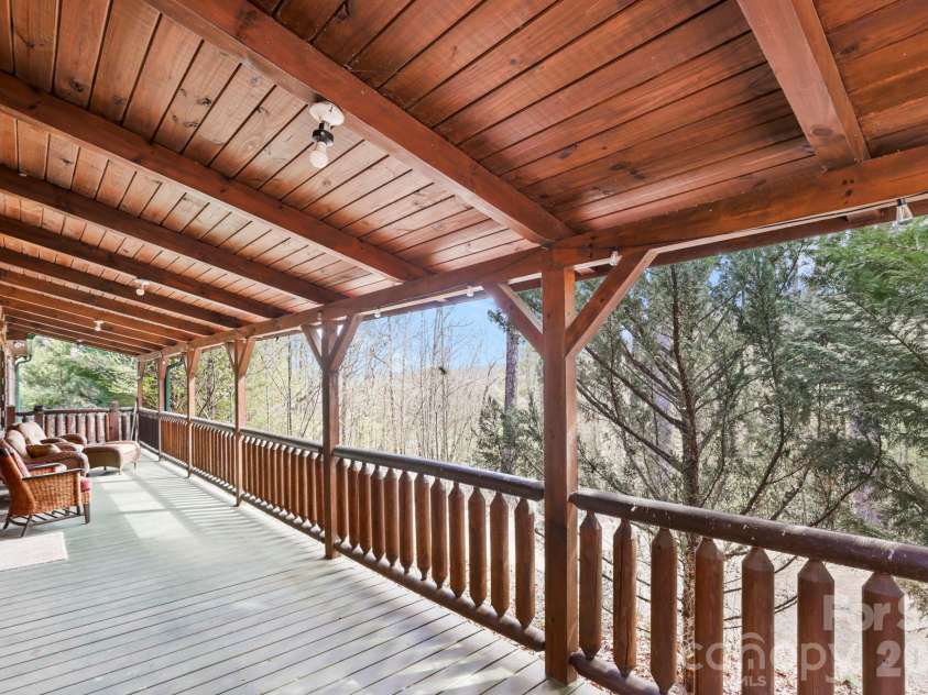 213 Big Valley Road, Pisgah Forest, NC 28768.  MLS# CAR4353319, YatesRealty ID 26629. Love the covered Porch 