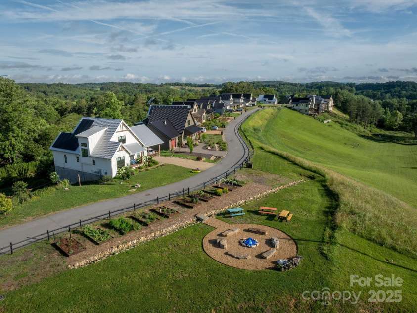 237 Westridge Farm Road, Asheville, NC 28804.  MLS# CAR4282360, YatesRealty ID 2663. Aerial of community gardens and neighborhood.