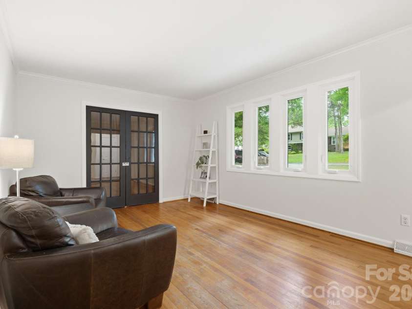 6535 Summerlin Place, Charlotte, NC 28226.  MLS# CAR4378322, YatesRealty ID 26632. Dining Room w/ additional flex space with pocket doors.