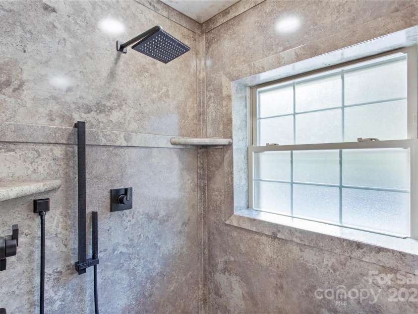 17 Aaron Way, Waynesville, NC 28786.  MLS# CAR4319469, YatesRealty ID 2664. Each side has a rain shower and wand