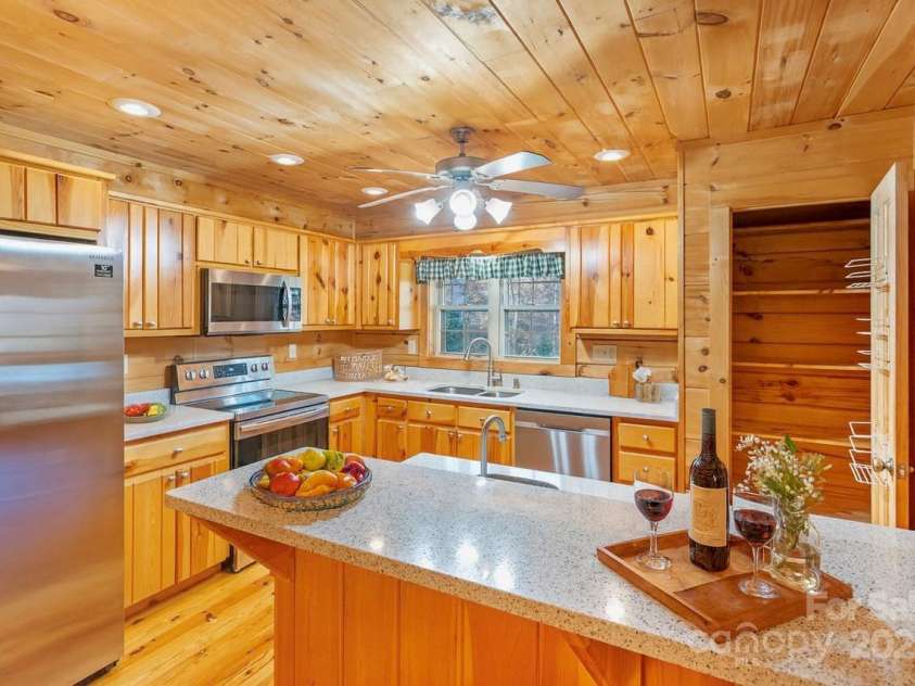 17 Aaron Way, Waynesville, NC 28786.  MLS# CAR4319469, YatesRealty ID 2664. Kitchen with Bar and prep sink