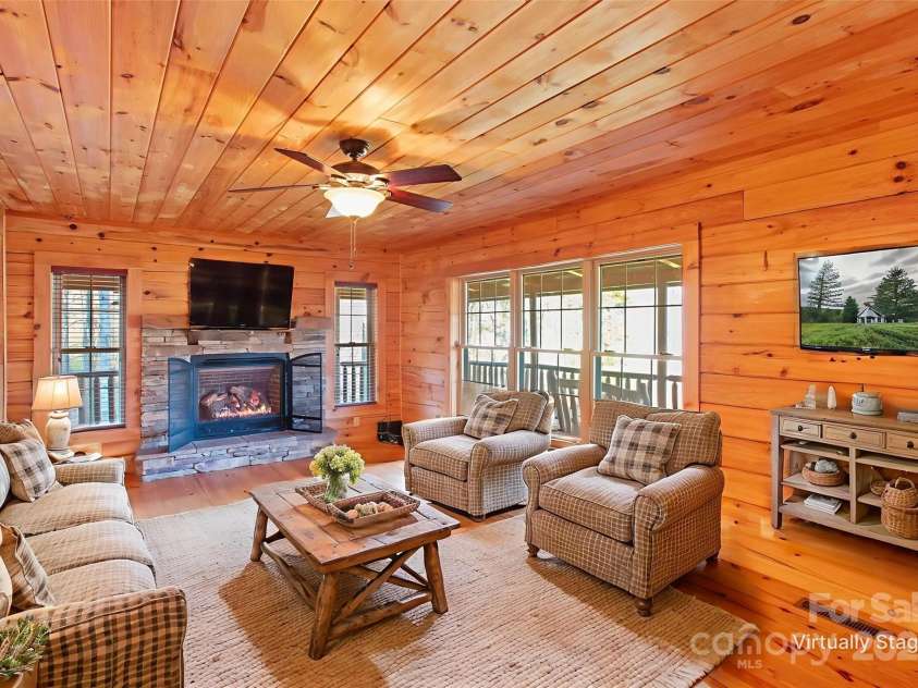 17 Aaron Way, Waynesville, NC 28786.  MLS# CAR4319469, YatesRealty ID 2664. Living  with Gas Firelogs