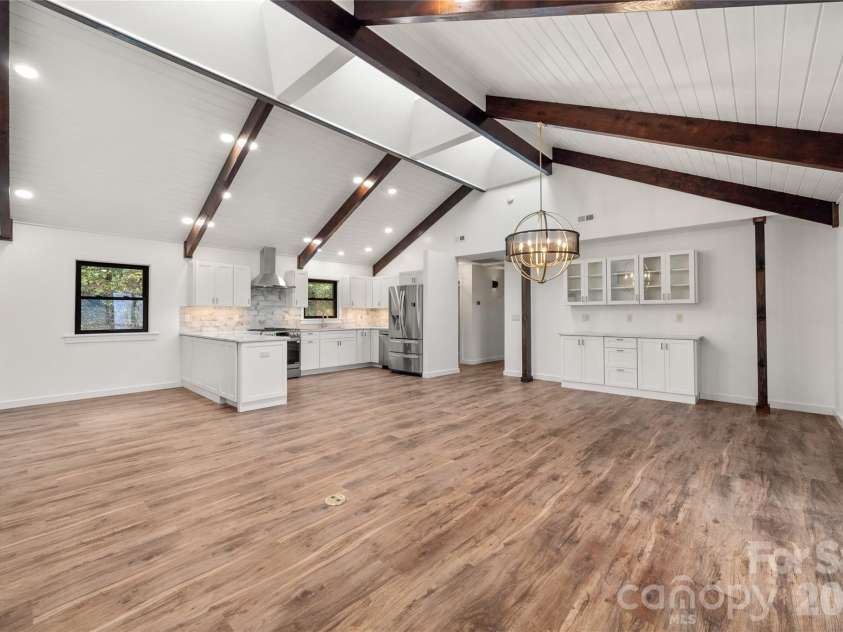 453 Friendly Acres Drive, Waynesville, NC 28786.  MLS# CAR4351574, YatesRealty ID 2664. Huge area perfect for entertaining