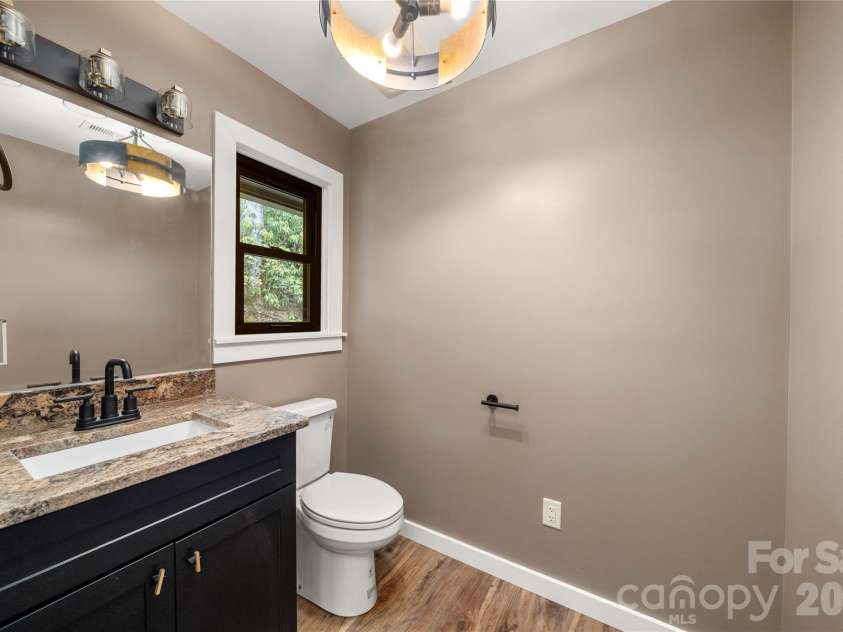 453 Friendly Acres Drive, Waynesville, NC 28786.  MLS# CAR4351574, YatesRealty ID 2664. Main Level Half Bath