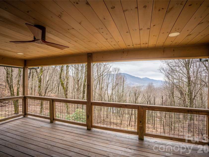 453 Friendly Acres Drive, Waynesville, NC 28786.  MLS# CAR4351574, YatesRealty ID 2664. Thoughtfully updated exterior a new deck ceiling.