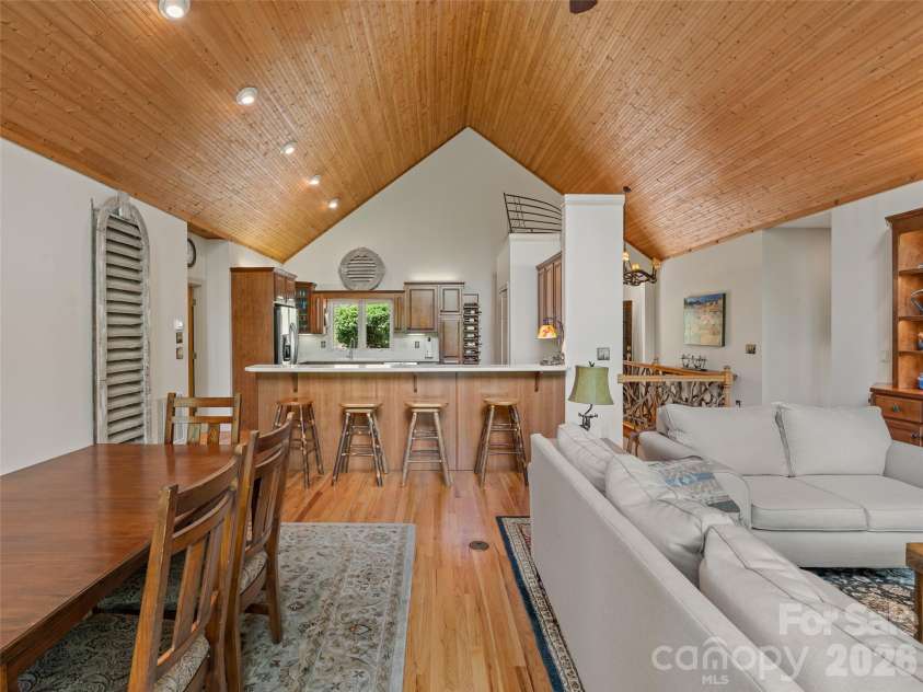 26 Walnut Drive, Mills River, NC 28759.  MLS# CAR4369713, YatesRealty ID 26643. Great Room with view of kitchen and dining room
