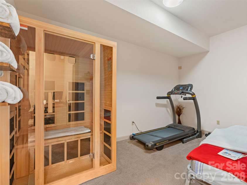 26 Walnut Drive, Mills River, NC 28759.  MLS# CAR4369713, YatesRealty ID 26643. Spa room on lower level, with Sauna (conveys)