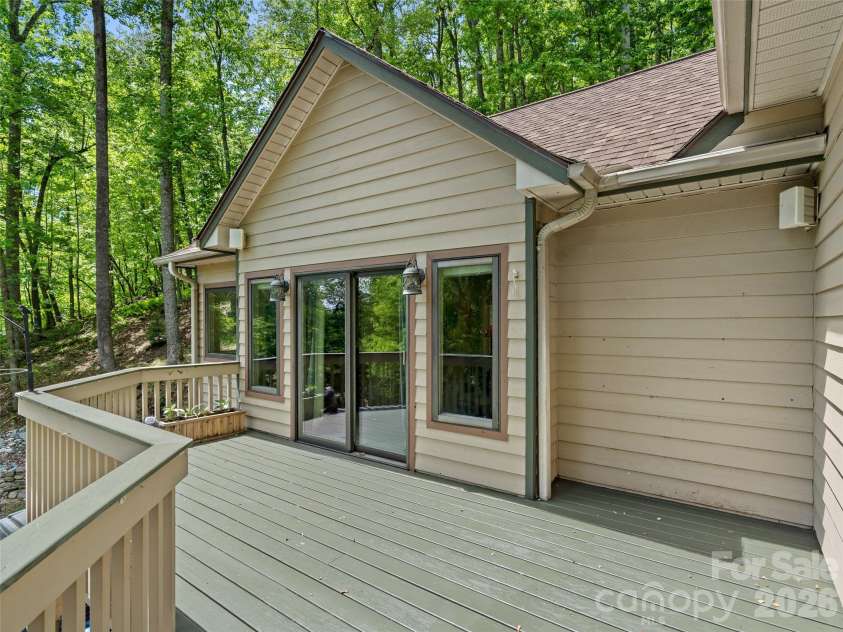 26 Walnut Drive, Mills River, NC 28759.  MLS# CAR4369713, YatesRealty ID 26643. Upper deck with Doors to Primary Suite