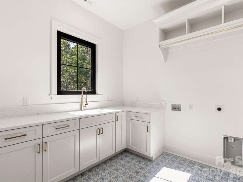 8740 Kristie Lane, Indian Land, SC 29707.  MLS# CAR4380162, YatesRealty ID 26644. Laundry- second floor