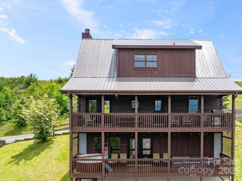 81 Scenic Wolf Drive, Mars Hill, NC 28754.  MLS# CAR4266287, YatesRealty ID 26649. Two covered decks.