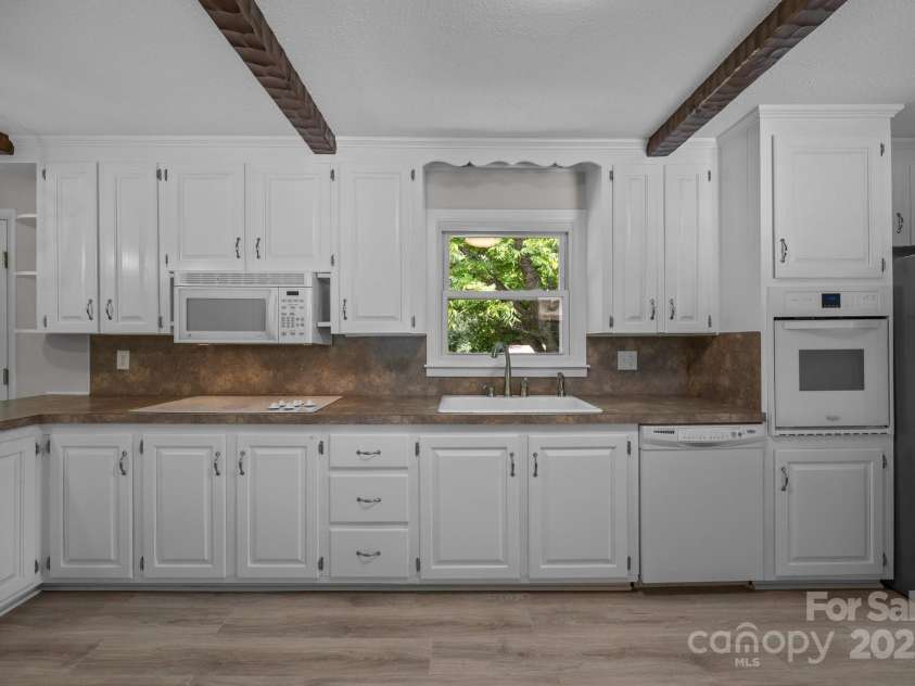 303 Jean Avenue, Kannapolis, NC 28083.  MLS# CAR4264386, YatesRealty ID 26651. Cabinets painted inside and outside