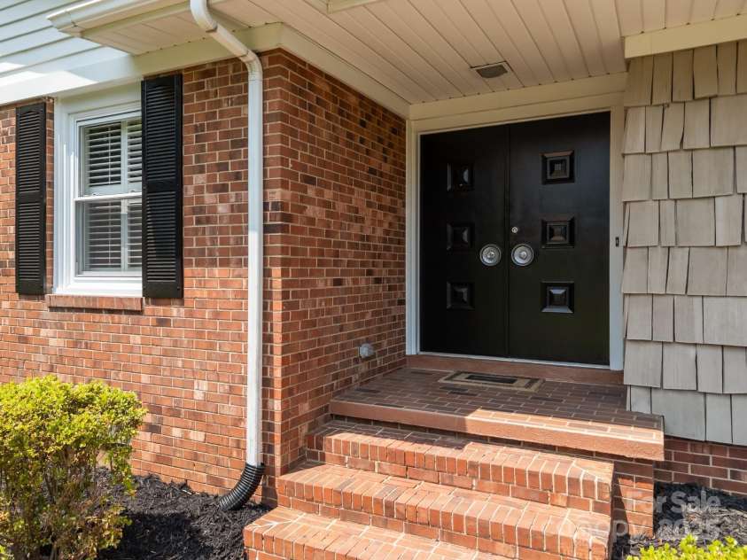 303 Jean Avenue, Kannapolis, NC 28083.  MLS# CAR4264386, YatesRealty ID 26651. Double Door entry
