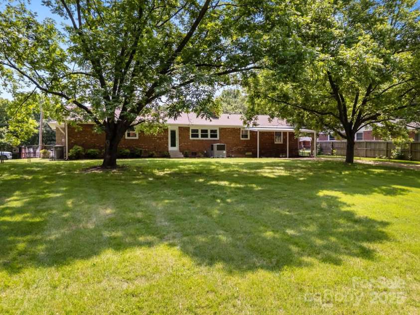 303 Jean Avenue, Kannapolis, NC 28083.  MLS# CAR4264386, YatesRealty ID 26651. Fenced Backyard