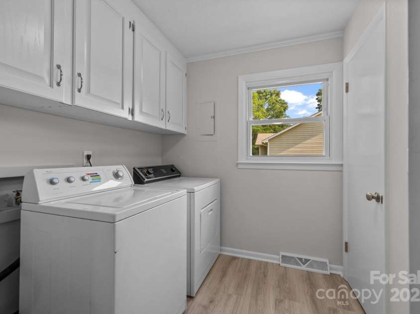 303 Jean Avenue, Kannapolis, NC 28083.  MLS# CAR4264386, YatesRealty ID 26651. Laundry Room with Storage