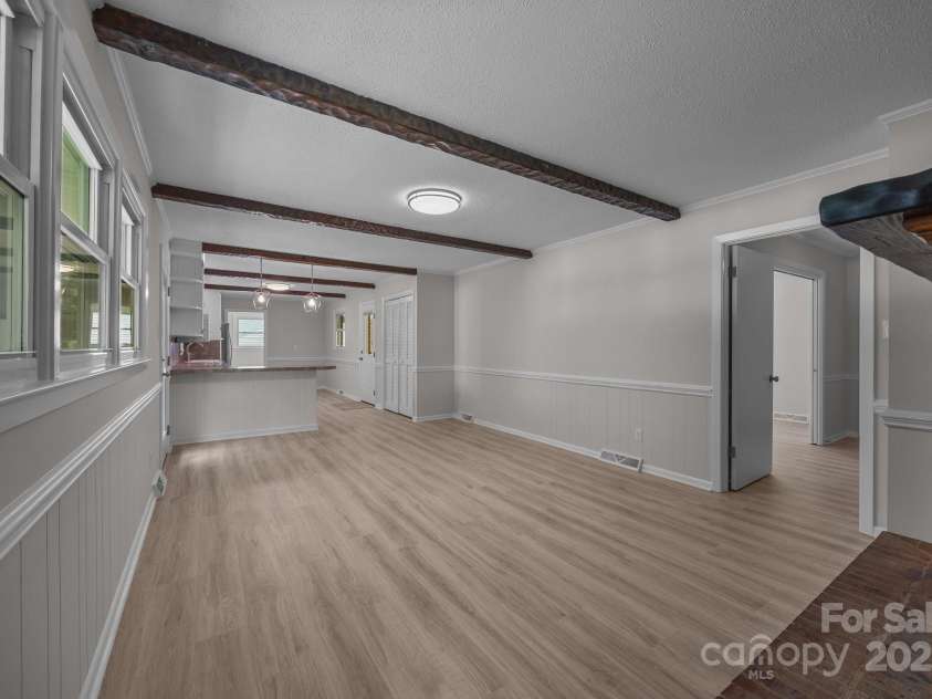 303 Jean Avenue, Kannapolis, NC 28083.  MLS# CAR4264386, YatesRealty ID 26651. Open Den, Kitchen, Dining