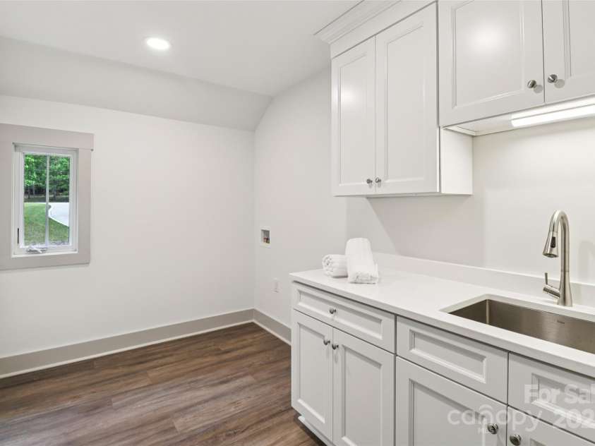 416 Plantation Way, Mount Gilead, NC 27306.  MLS# CAR4270243, YatesRealty ID 26658. Laundry Room