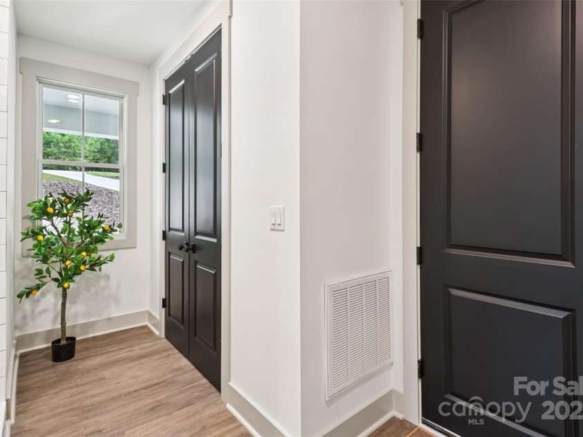 416 Plantation Way, Mount Gilead, NC 27306.  MLS# CAR4270243, YatesRealty ID 26658. Mudroom with shower and Garage Entry