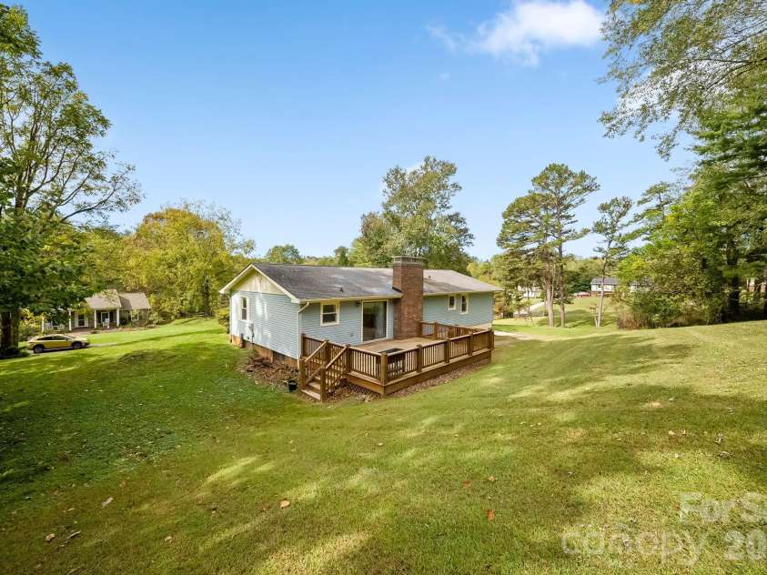 16 Sun Valley Court, Alexander, NC 28701.  MLS# CAR4263633, YatesRealty ID 26660. Large back deck for grilling and entertaining
