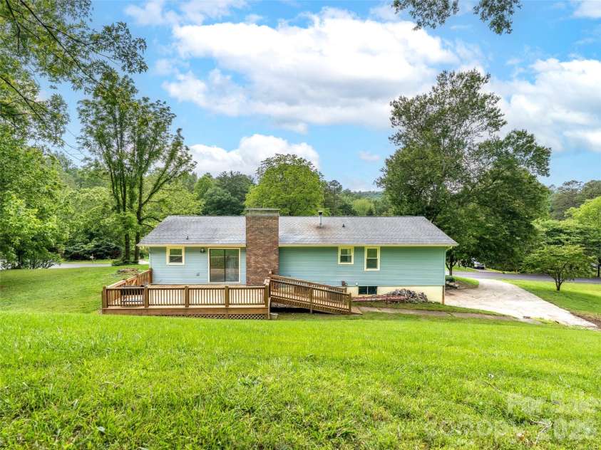 16 Sun Valley Court, Alexander, NC 28701.  MLS# CAR4263633, YatesRealty ID 26660. Large backyard