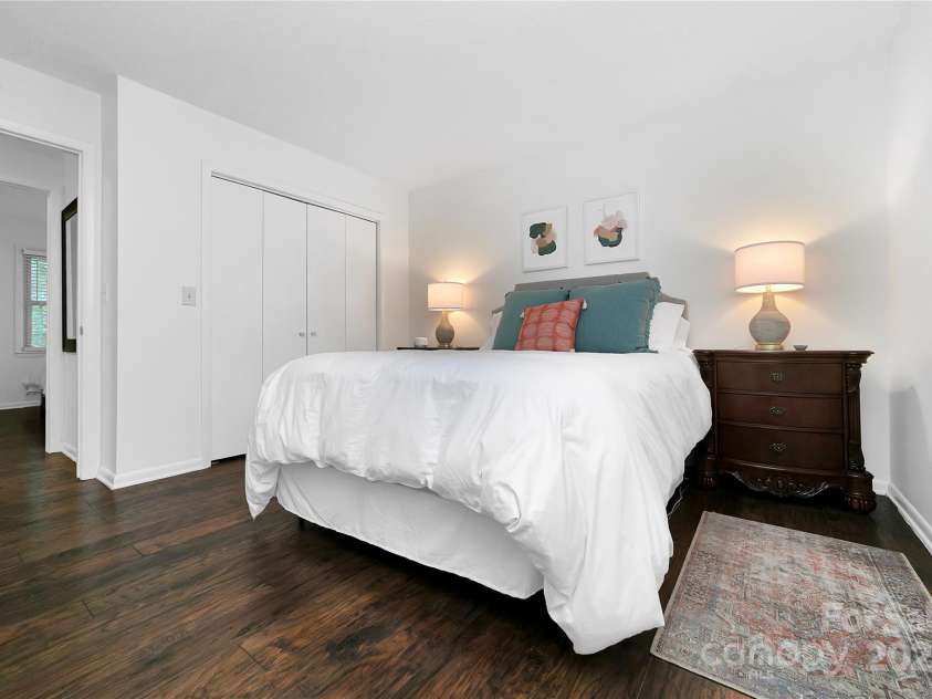 3703 Connestee Trail, Brevard, NC 28712.  MLS# CAR4215102, YatesRealty ID 26660. Primary Bedroom which has an en-suite full bath.