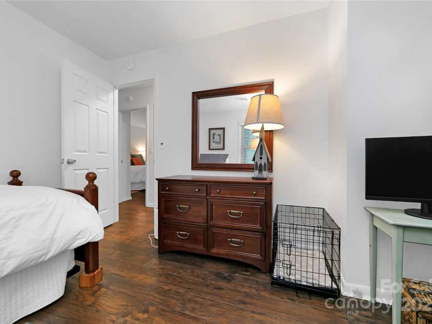 3703 Connestee Trail, Brevard, NC 28712.  MLS# CAR4215102, YatesRealty ID 26660. The first guest bedroom which also could make a great office.