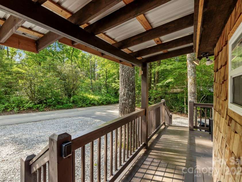 40 Squirrel Lane, Sapphire, NC 28774.  MLS# CAR4272442, YatesRealty ID 26666. Covered Entrance